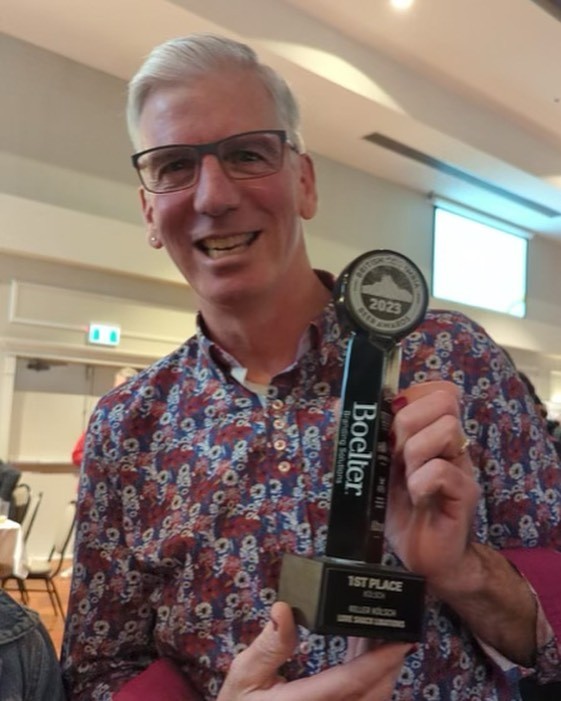 Founder Dave Paul holding his first place trophy